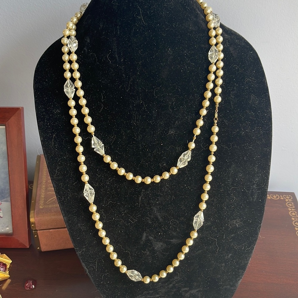 Vintage faux pearl and crystal necklace. 50 “ long.